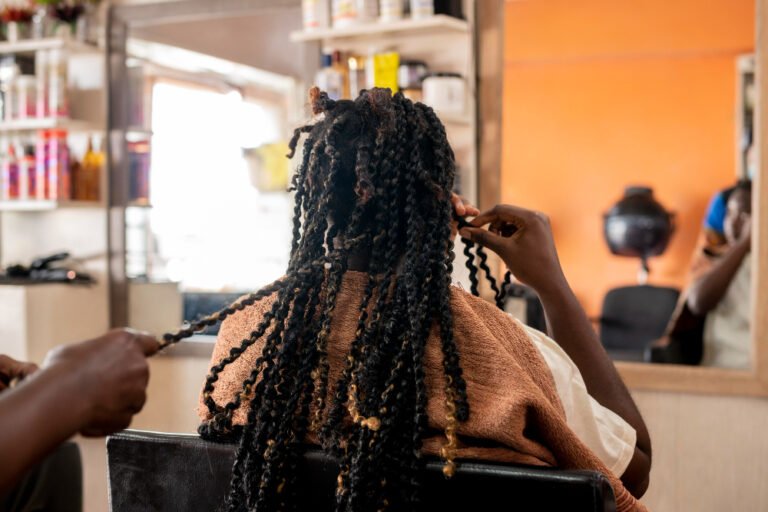 Stylists and clients busy in a Kenyan salon