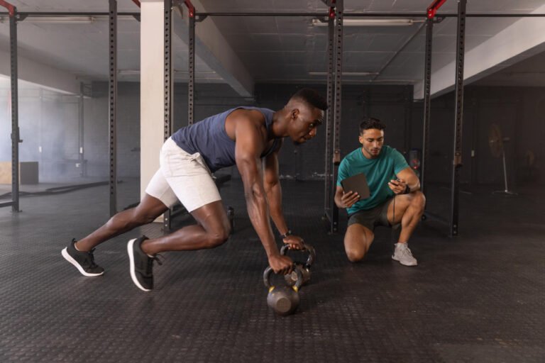 Trainer and group finishing a class together, what a gym website in Kenya has to fill