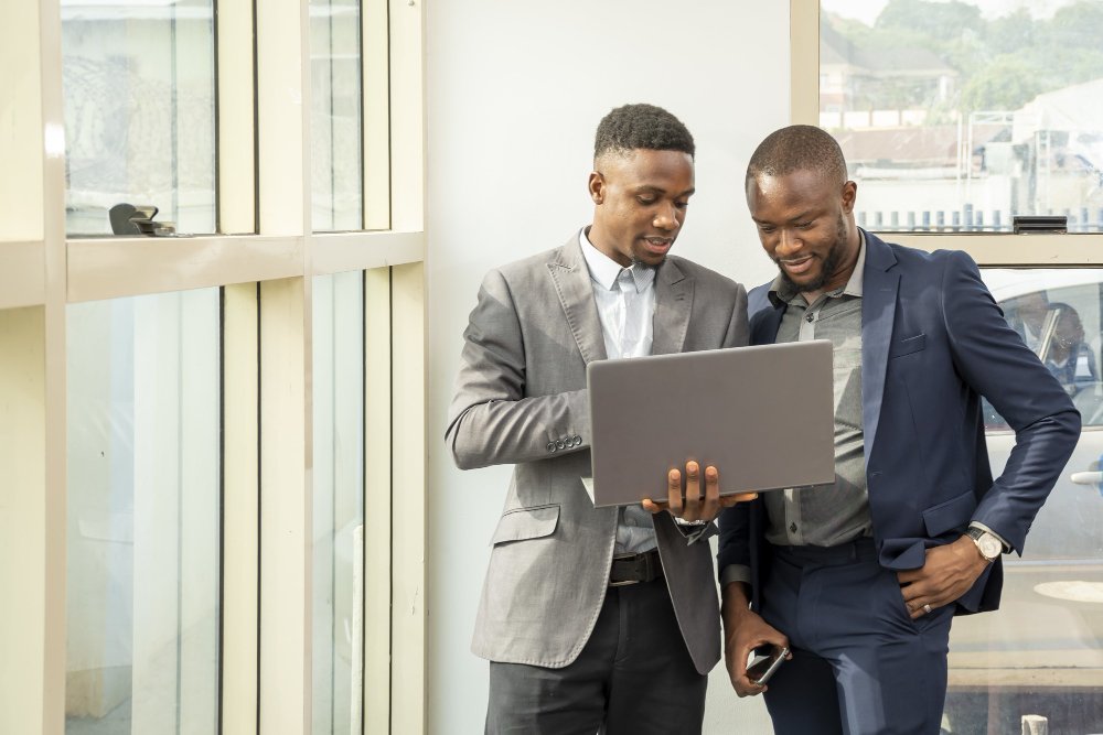 Colleagues saving pages together while working to recover your website files